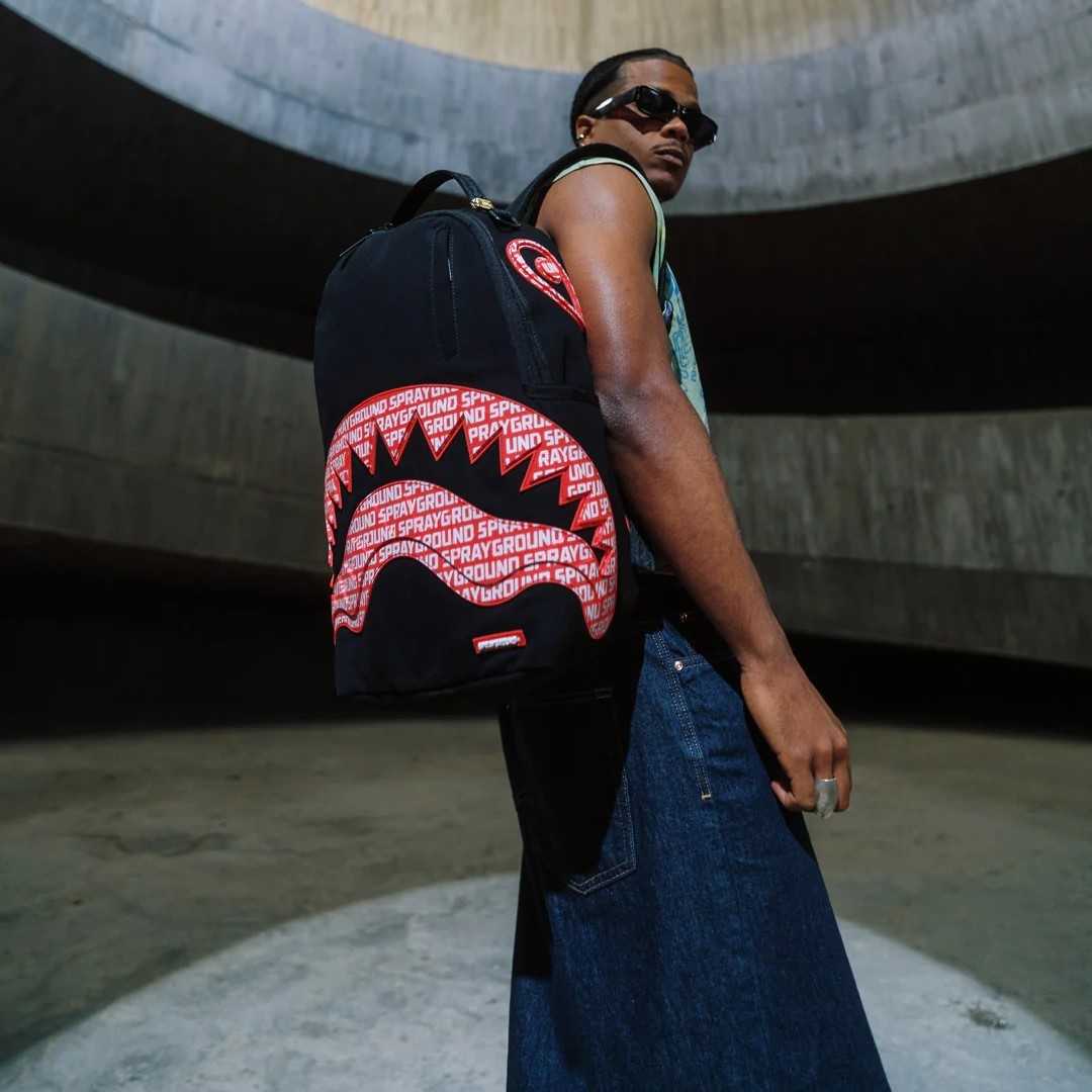 Sprayground - लोगो माउथ कोर Dlx कॉटन बैकपैक