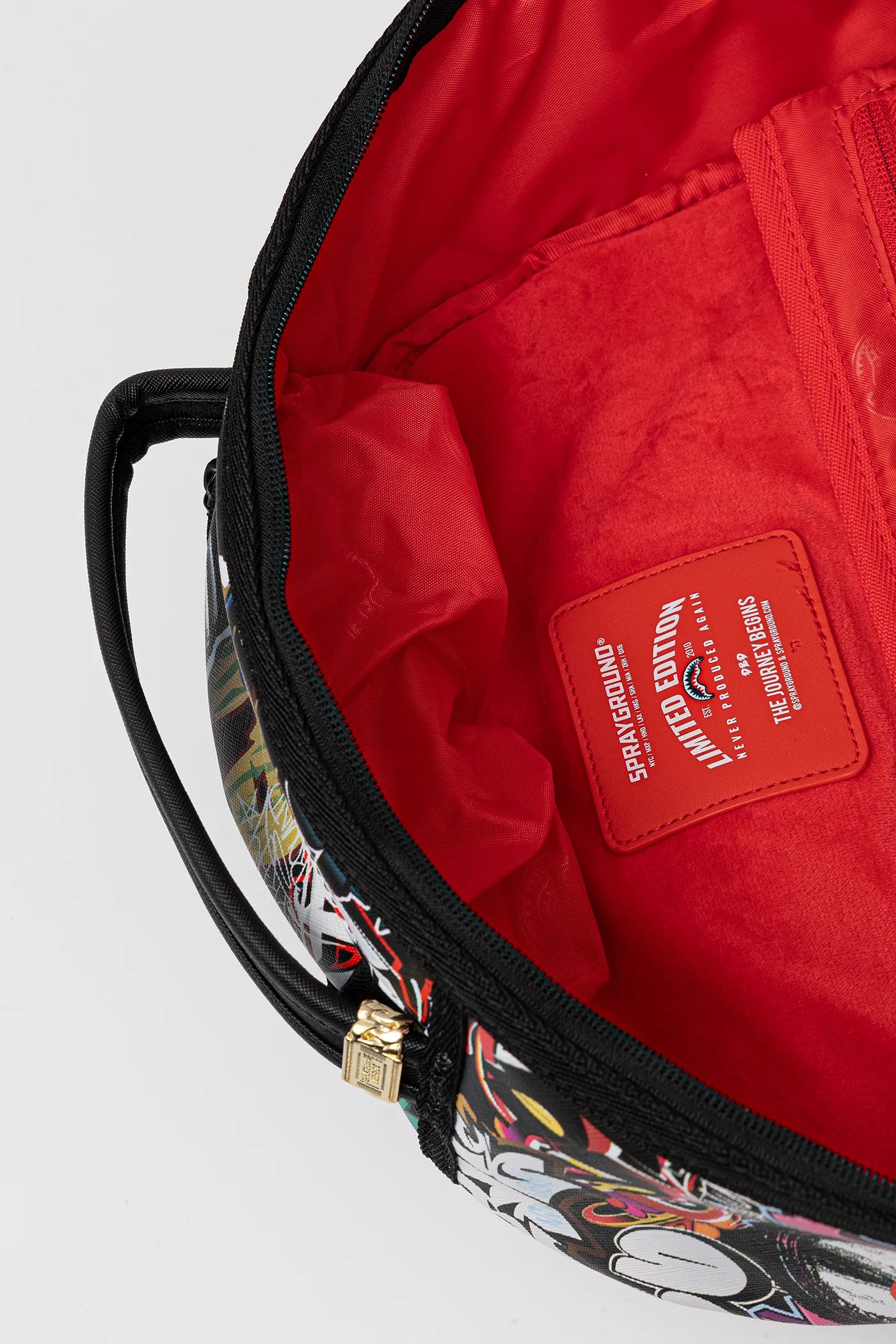 Sprayground - स्प्लिट साइबरशार्क Dlxsv बैकपैक