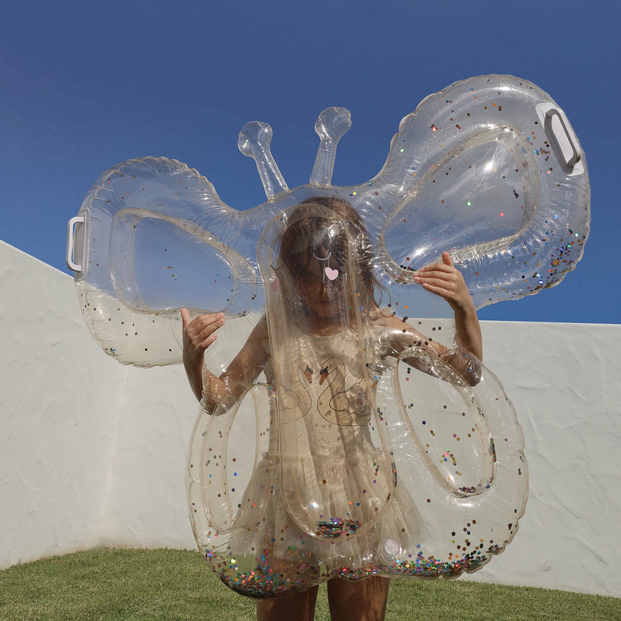 Sunnylife - कॉटन कैंडी बच्चों के तितली समुद्र और पूल गद्दा