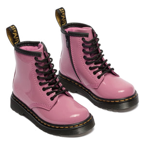 Dr Martens - 1460 J पेटेंट लेस-अप बूट | गुलाबी