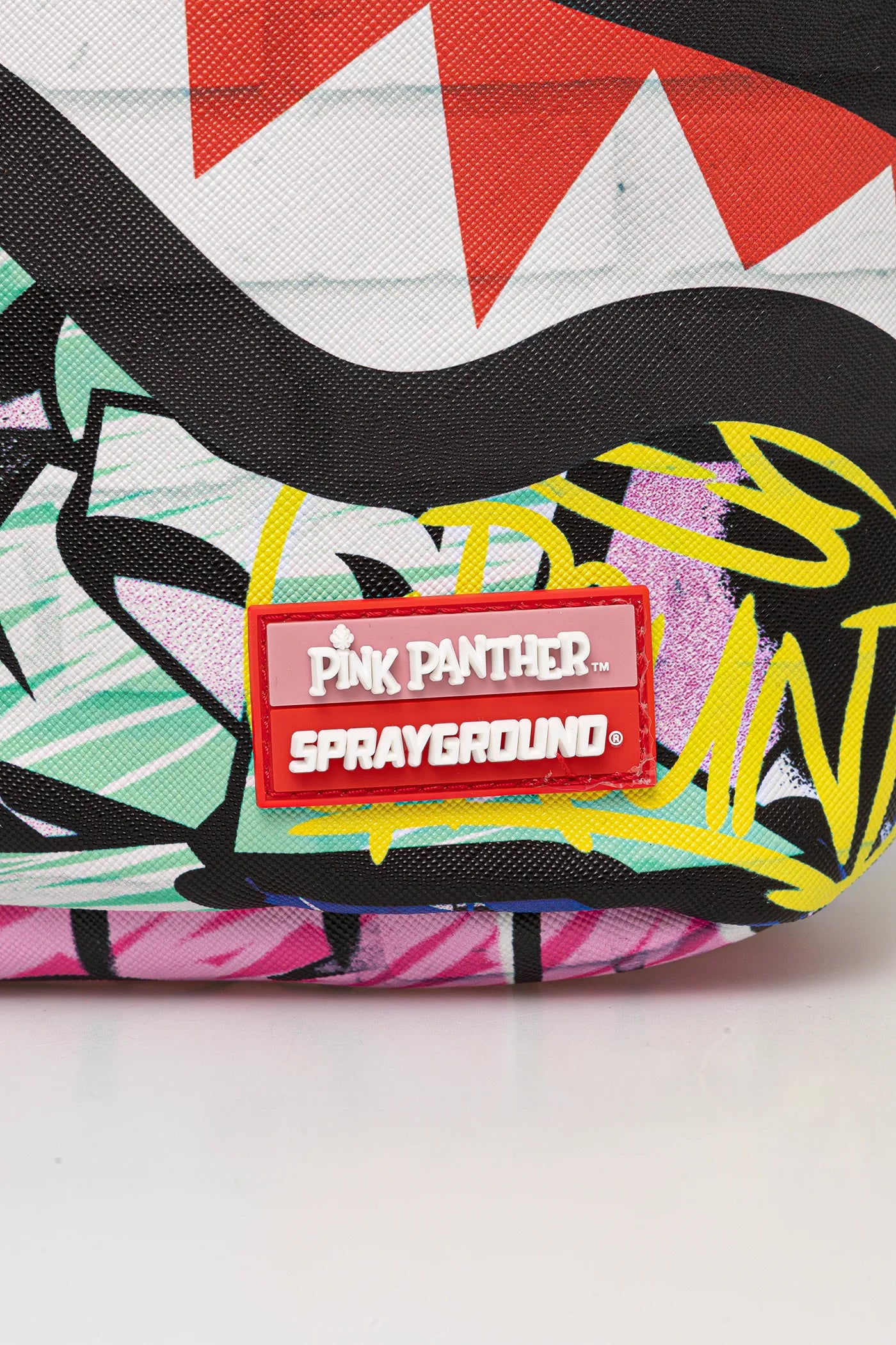 Sprayground - पिंक पैंथर ग्राफिटी बॉयामा Dlxr सर्ट çantası