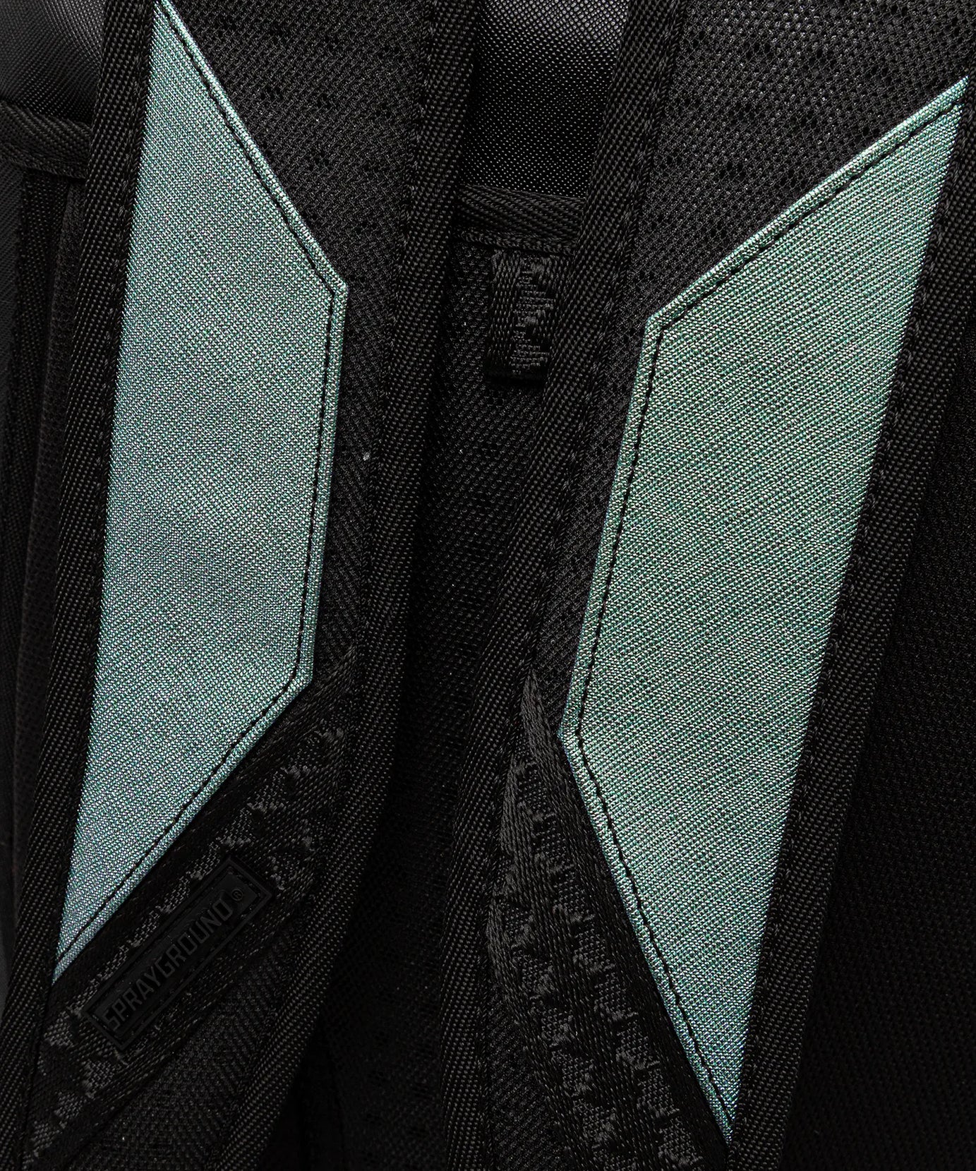 Sprayground - शार्क सेंट्रल ऑयल स्टीक डीएलएक्सस बैकपैक