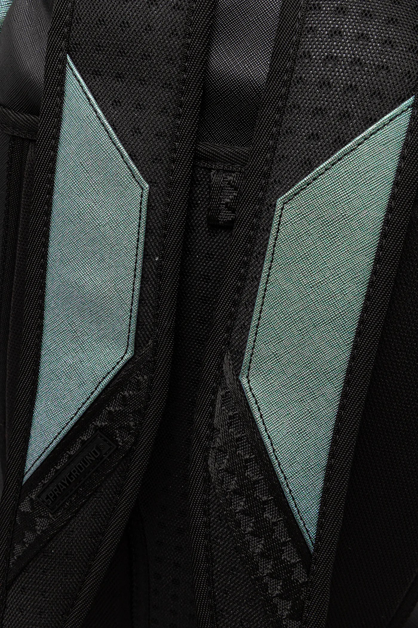 Sprayground - शार्क सेंट्रल ऑयल स्टीक डीएलएक्सस बैकपैक