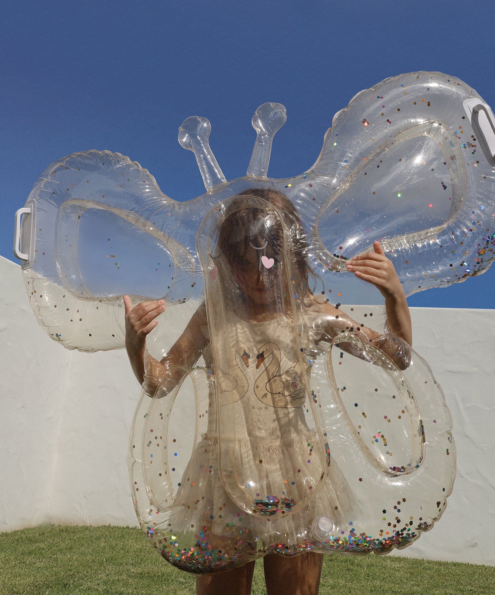 Sunnylife - कॉटन कैंडी बच्चों के तितली समुद्र और पूल गद्दा